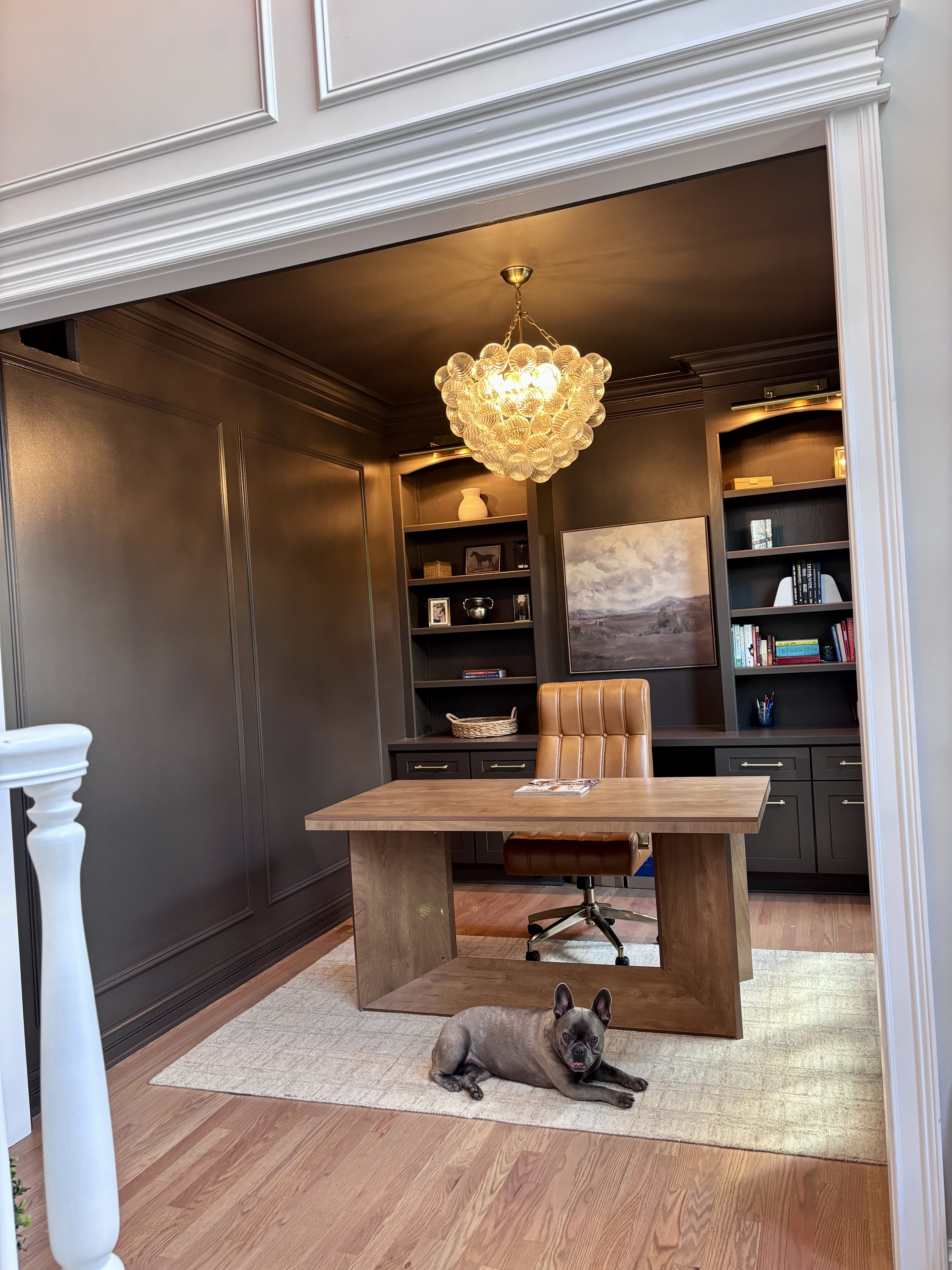Custom home office with built-in shelving