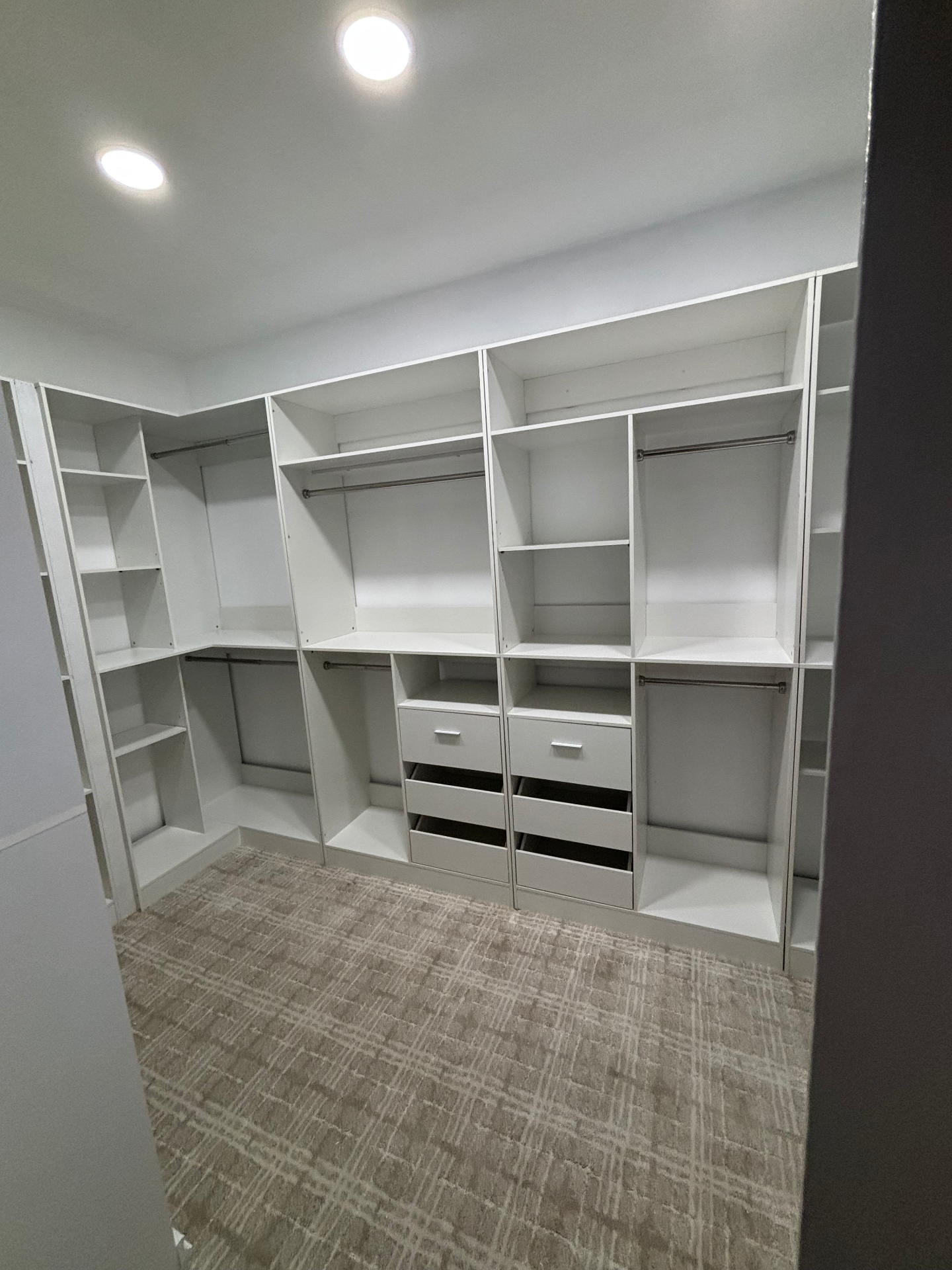 Master closet built-ins with drawers and shelving